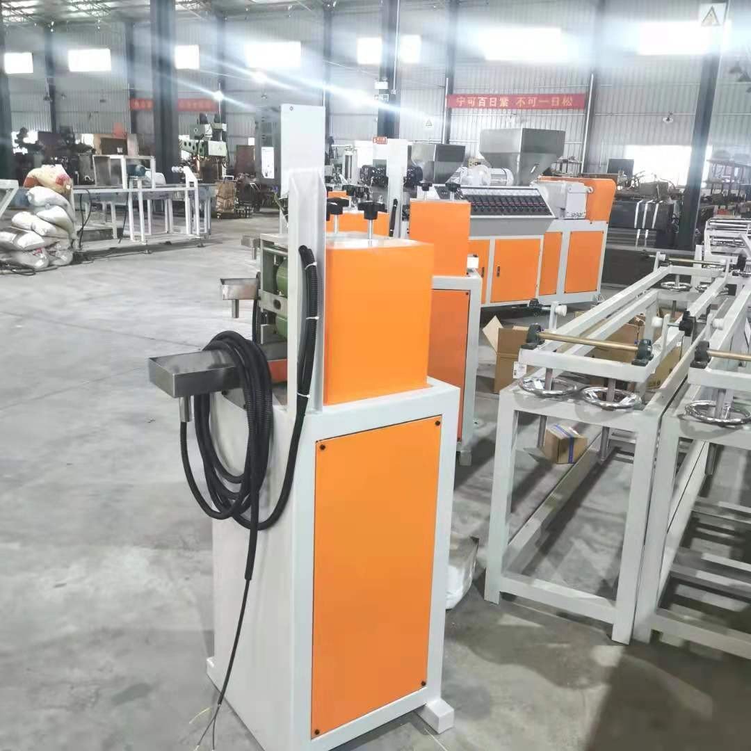 Plastic extrusion production line equipment installed in a factory workshop