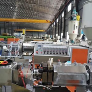 Plastic extrusion machine with material feed hopper, control panel and die assembly